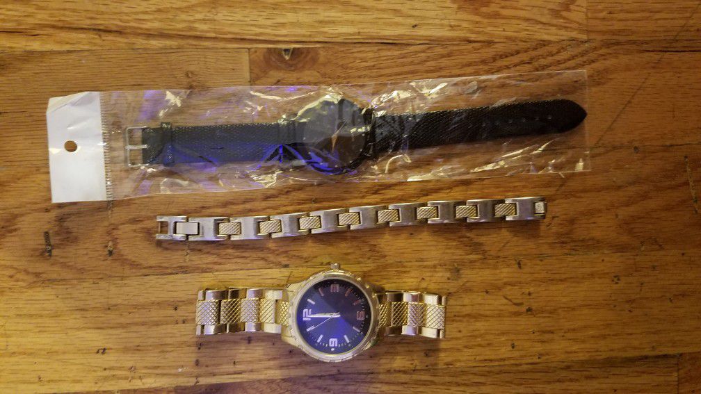 2 watches and bracket