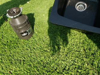 Dual Mount Granite 33.in 4-Hole Double Bowl Kitchen Sink in Metallic Black

