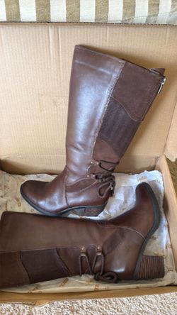 A brand new brown leather boots size 8
