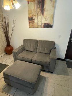 Love Seat With Matching Ottoman by Ashley Furniture
