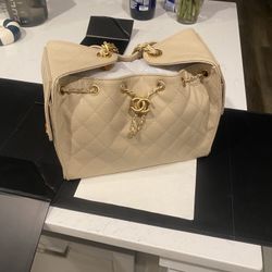Caviar Quilted Small Chanel 25 Handbag Beige