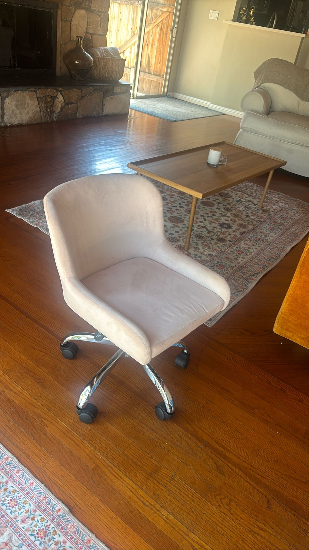 baby pink rolling chair 