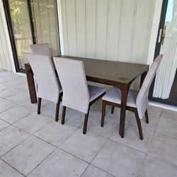 Table and 4 Chairs - Available 