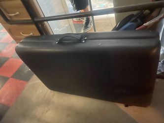 Massage table