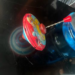 Antique 1960S all metal, spinning kids toy