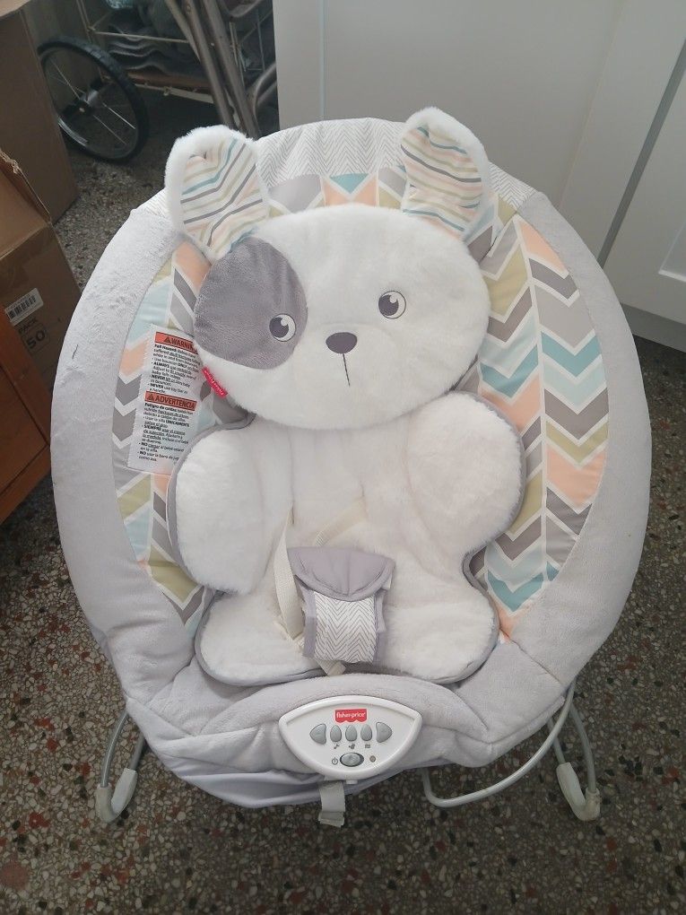 FISHER PRICE SNUGAPUPPY DELUXE BABY BOUNCER, HAS CALMING VIBRATIONS, MUSIC & SOUNDS WITH VOLUME CONTROL.