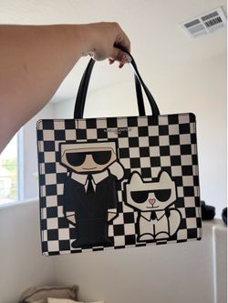 Karl Lagerfeld Bag comes with crossbody strap