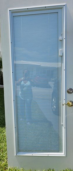 31 3/4 × 79 Exterior door with enclosed mini blinds