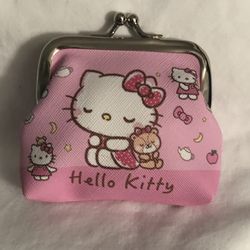 Hello Kitty coin purse Hello Kitty graphics with  kiss lock closures pink.