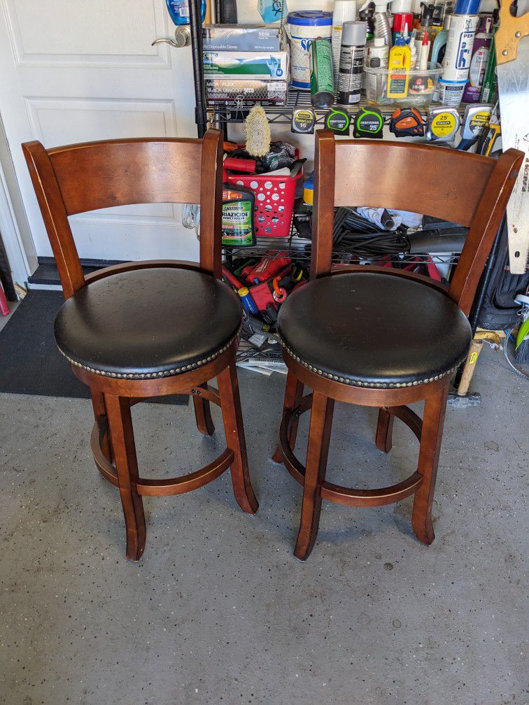 2  Standard Barstools Solid Wood Still In Decent Condition