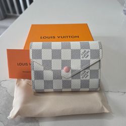 White and pink wallet