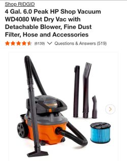 Ridgid 4 gal Wet/Dry Shop Vac With Blower -New but 1 glued wheel