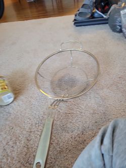 stainless steel fine-mesh strainer (also called a sieve or skimmer)