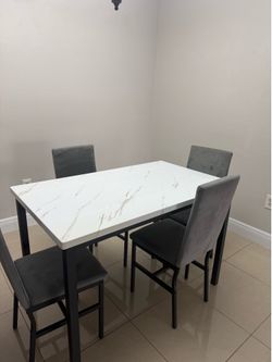 Dining set (Table & Chairs included)