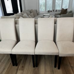 4 Beige dining room chairs
