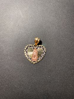 10 k real solid gold pendant beautiful 1” and 1.8 gr