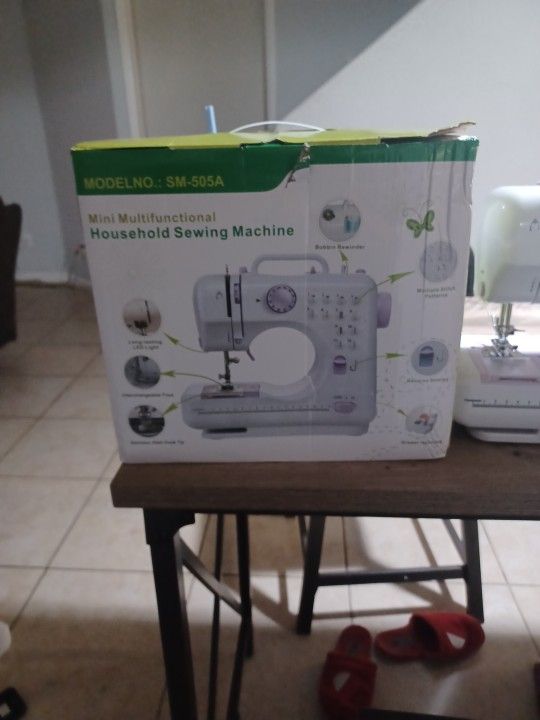 Sewing Machine Brand New .