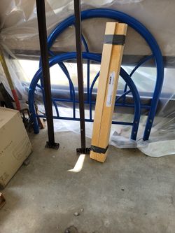 Solid blue round metal tween bed frame