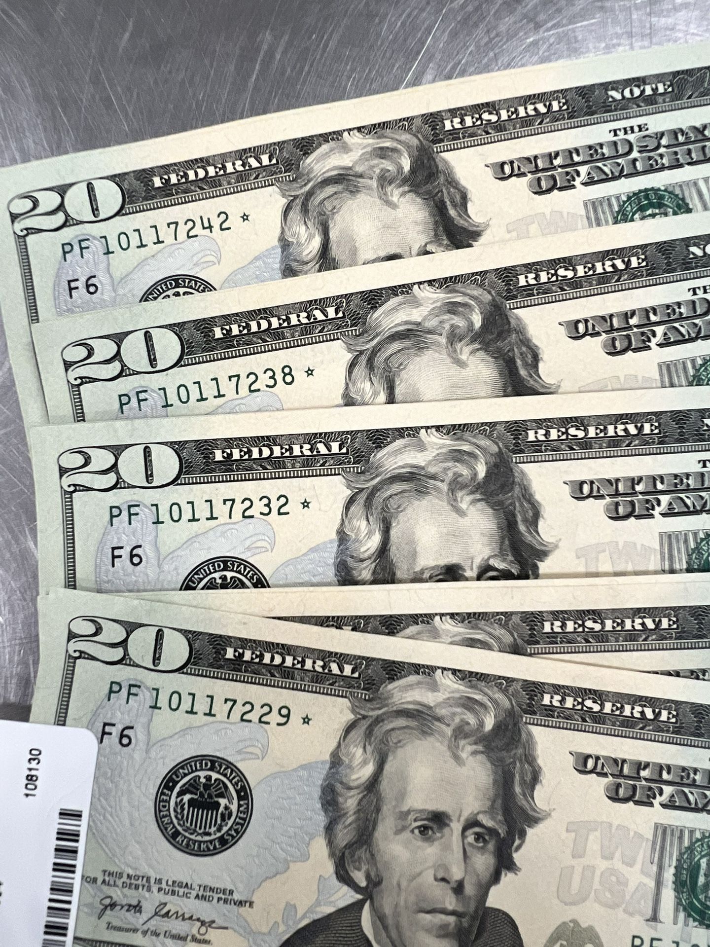 20 Dollar Bills In Numerical Oder With Stars On The