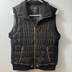 Women’s Calvin Klein Quilted Puffy Vest. Black w/ Gold. Size Large 