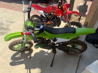 Green kid dirt bike