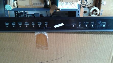 Dishwasher control assembly with overlay