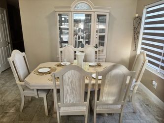 Table with matching china cabinet