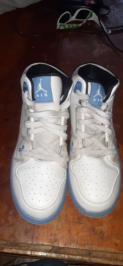 Blue and white Air jordans for the low size 6.5y