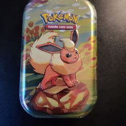 Prismatic Evolution Mini Tin