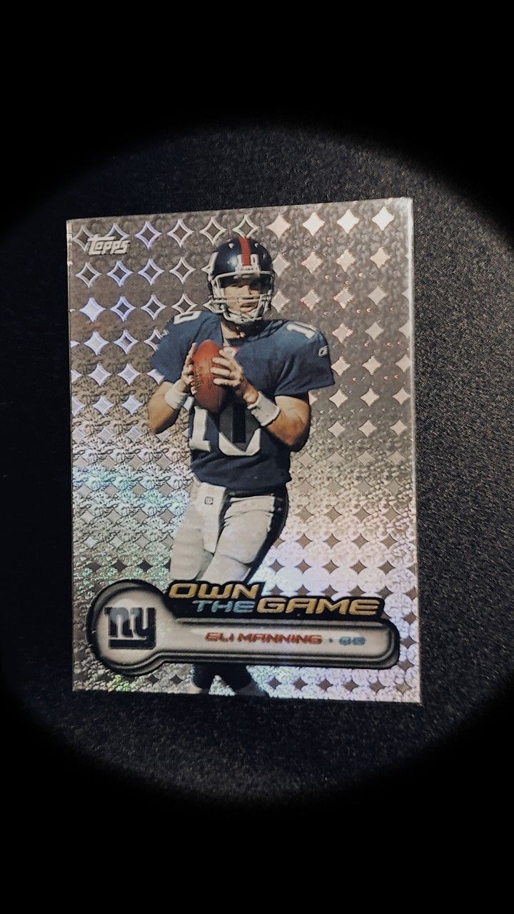 Topps -OWN THE GAME- ELI MANNING