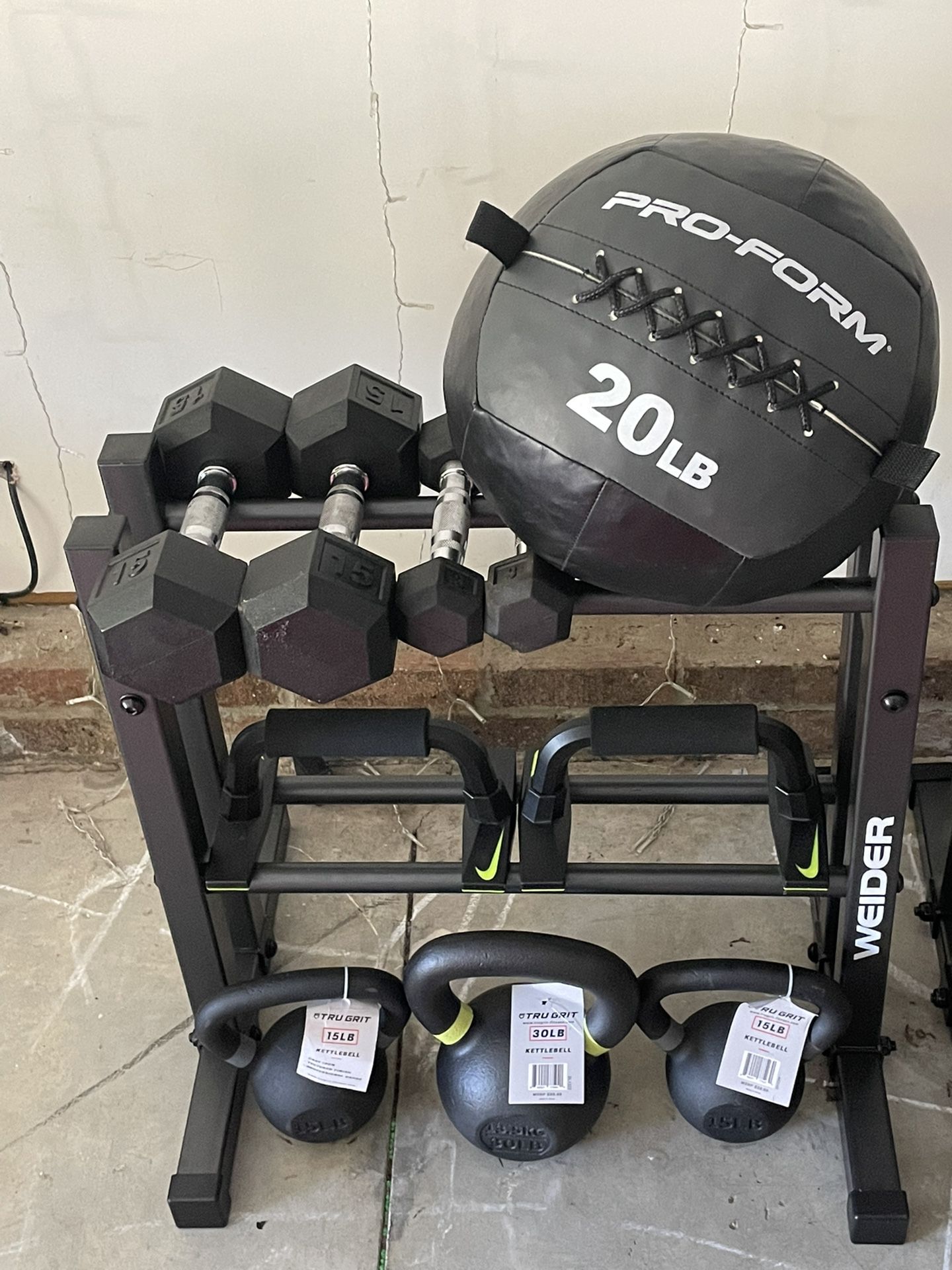 Dumbbells  Kettle Bells  Weight Ball Weight Rack And  Nike Push Up Grips All For $225