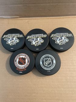 Nashville predators hockey pucks