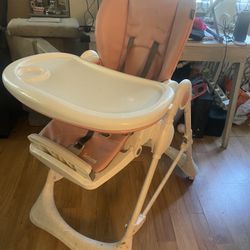 Adjustable High Chair; Price Negotiable 