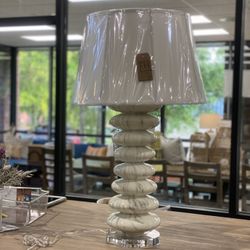 Balancing act table lamp by Bradburn Home. Different shade than stock photo. MSRP $1072. Our price $540 + sales tax 