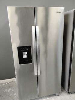 Refrigerador gris FRIGIDAIRE side by side