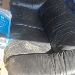 Black Leather Loveseat— loved by dogs