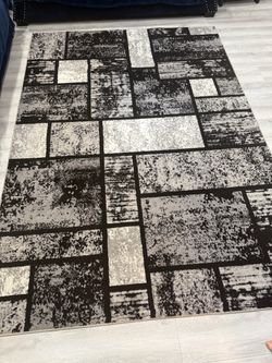 6ft by 9ft rug excellent condition