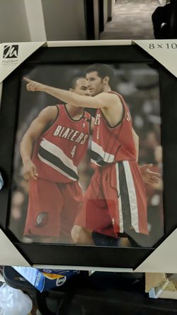Signed Rudy Fernandez picture blazers.