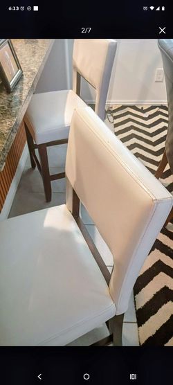 2 cream bar stools