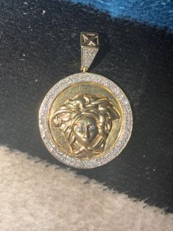 10k Versace pendant custom made piece with genuine diamonds nice pendant has good weight