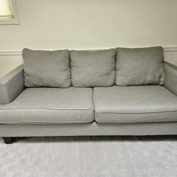 Gray Living Spaces Couch
