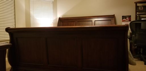 Solid Oak Cherry Wood Bedroom Set King Size Frame Armuoir fits up to a 40 inch TV asking $575 firm on the price.