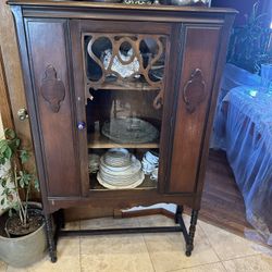 Curio cabinets, one antique