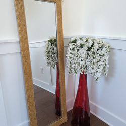 Standing Mirror With Vase And Flowers.