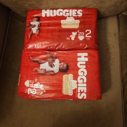 2 Packs HUGGIES Diapers Sz 2 (12-18lbs) 29 Per Pack