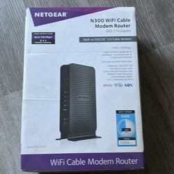NET GEAR N300 WiFi cable modem router