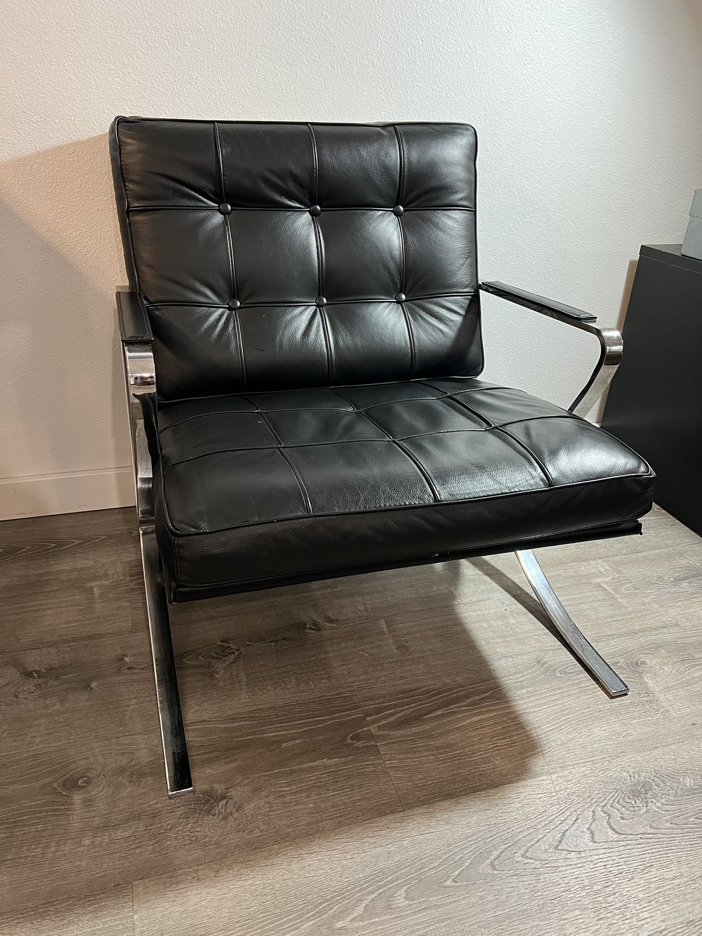 Italian black leather armchair