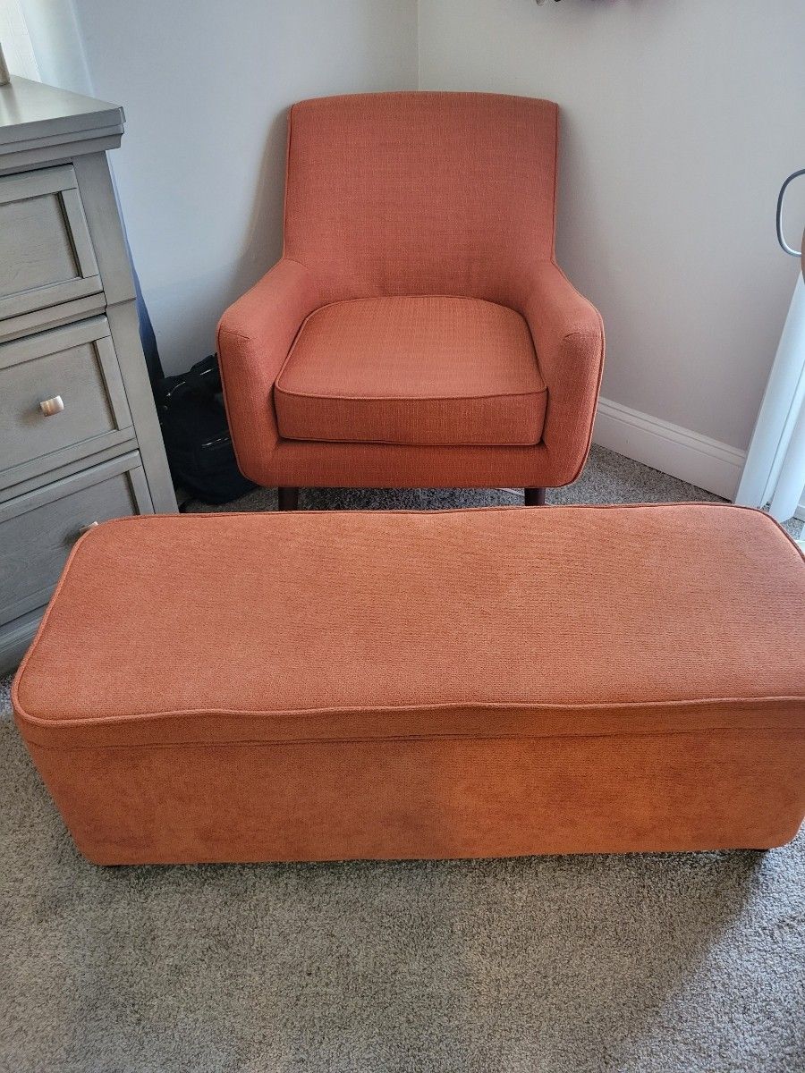 orange chair and ottoman