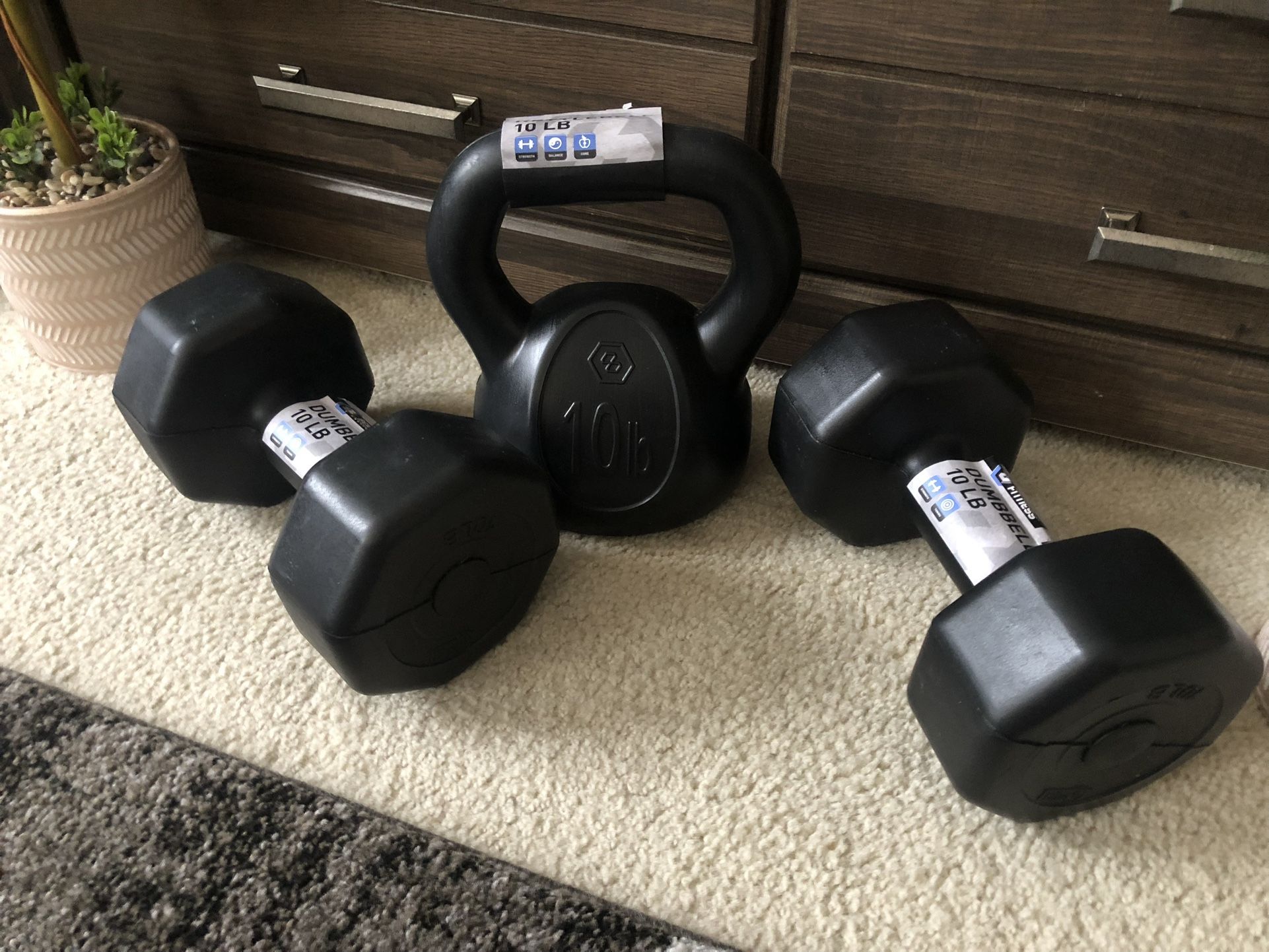 Brand new 3pcs. Set Two 10lbs Dumbells And One 10lbs Kettle Bell Weights