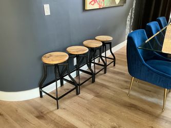 4 Adjustable Backless Barstools.